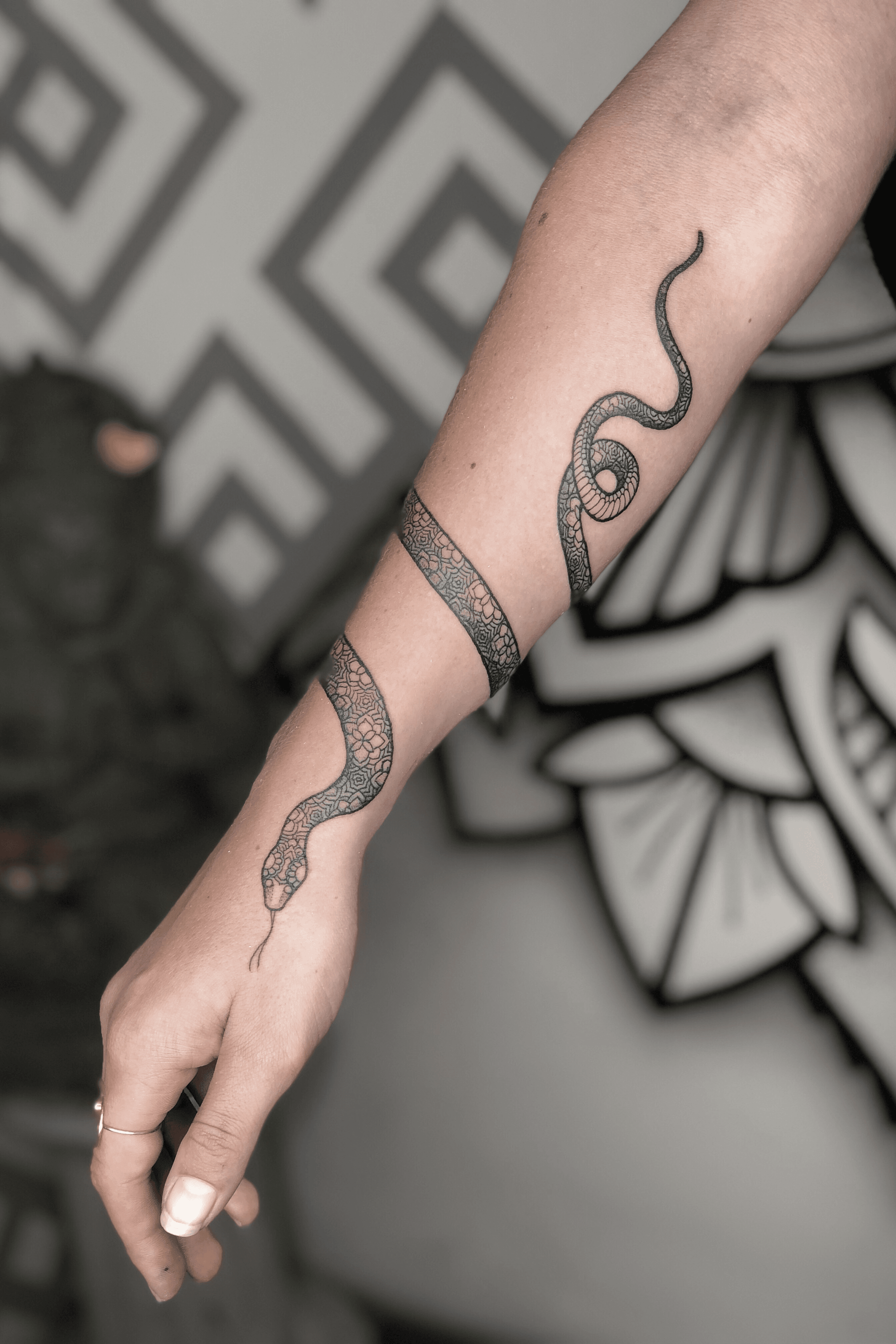 Freehand red snake tattoo on the left wrist  Tattoofilter USA for Men  and Women