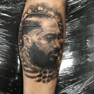 Capture the essence of masculinity with this detailed black and gray realism tattoo by Jake Masri. Perfect for those who appreciate fine art ink.