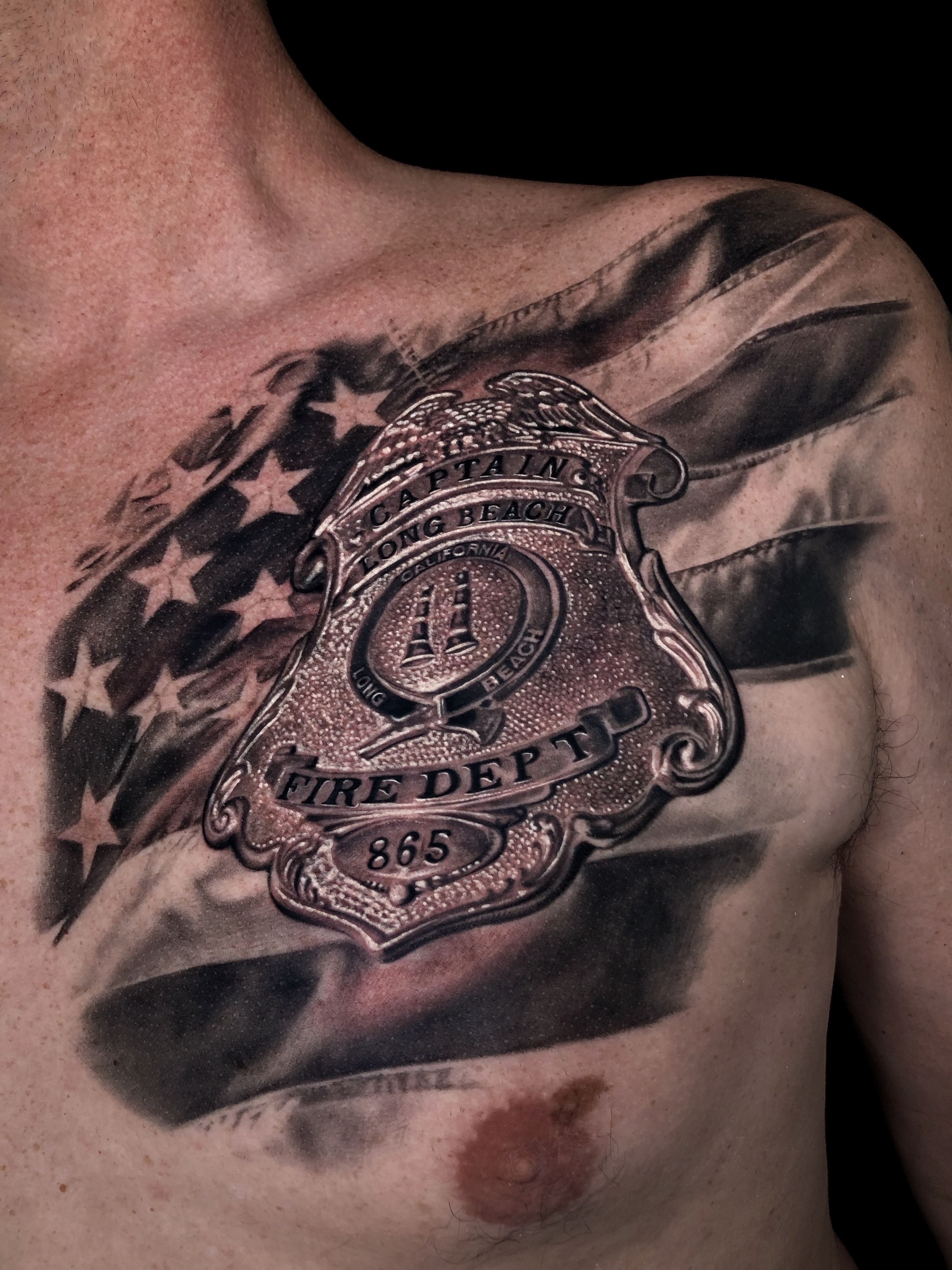 Awesome Grey Ink Firefighter Logo Tattoo On Right Half Sleeve