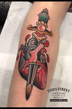Traditional heart and dagger tattoo by Craig Kelly
