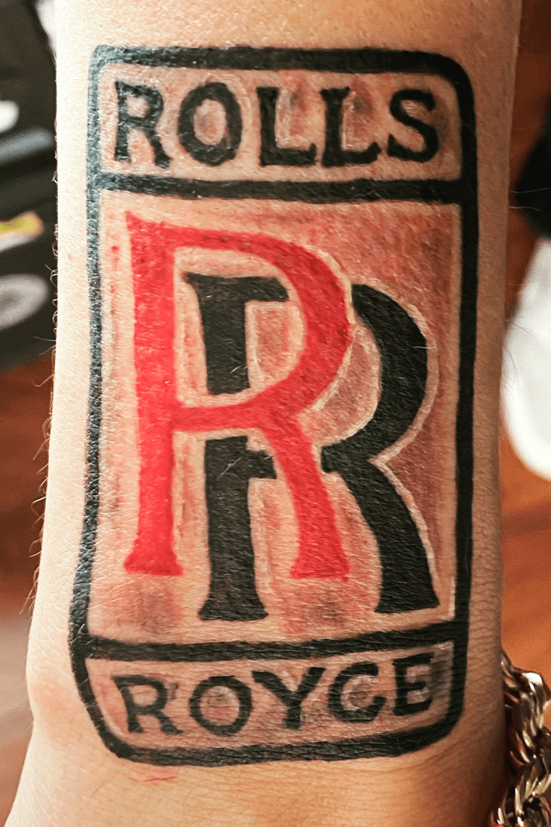 Man gets tattoo of RollsRoyce logo on his face  despite never owning one   Mirror Online
