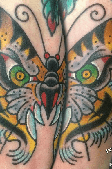 Traditional tiger butterfly tattoo by Craig Kelly 