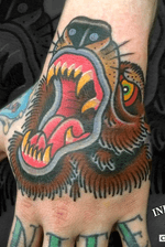 Traditional old school bear hand tattoo by Craig Kelly