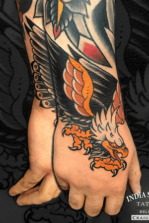 Traditional old school eagle hand tattoo by Craig Kelly