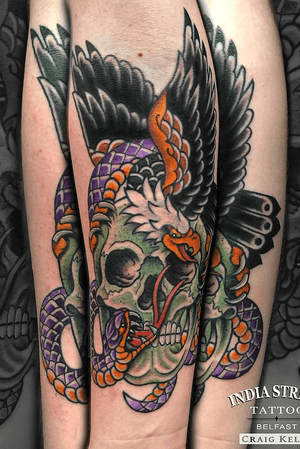 Traditional old school skull eagle snake tattoo by Craig Kelly