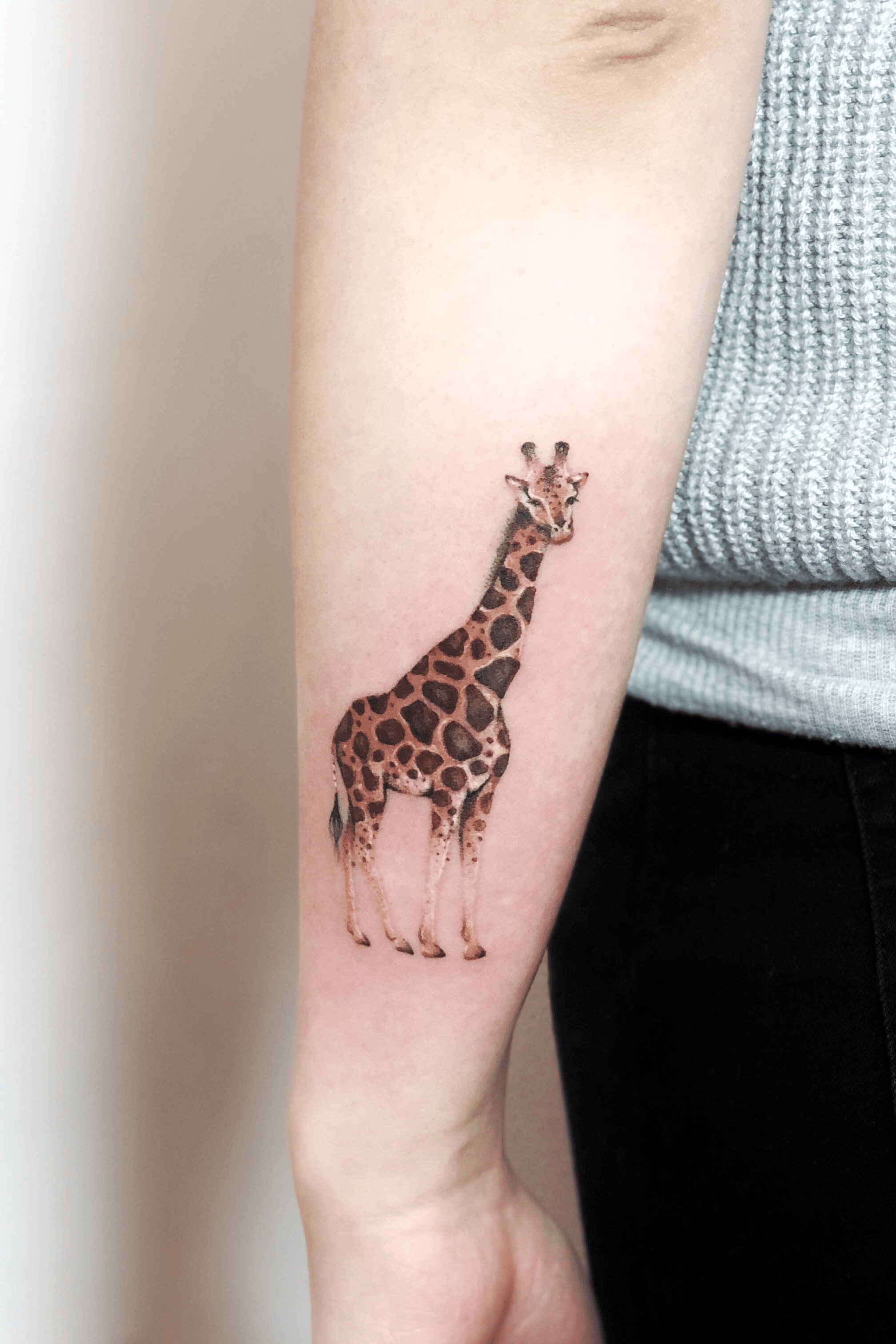 Cute and small giraffe  created and tattooed by Jessika Campos  Giraffe  tattoos Trendy tattoos Modern tattoos
