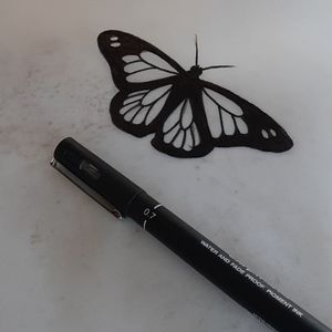 Simple black work butterfly flash 