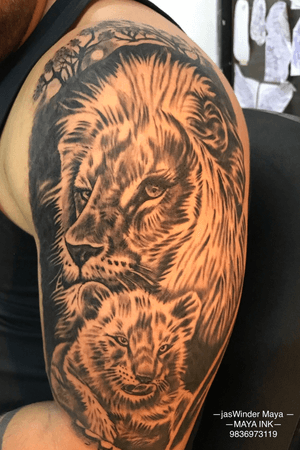 Realistic lion and cub tattoo