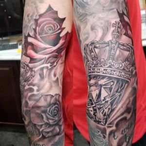 Roses, diamonds and maple leaf a part of  sleeve tattoo