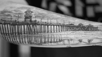 Dive into a mesmerizing world of sea and waves with this detailed blackwork forearm tattoo by Jake Masri.