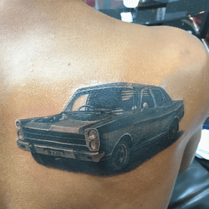 Realistic car tattoo done by the best ink tattoo studio 