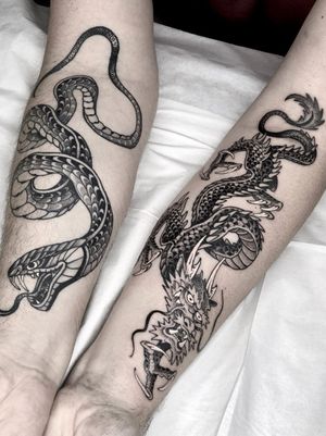 Snake and Dragon by artist Michelich