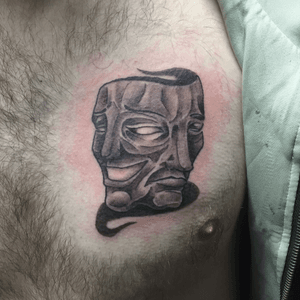 Black and grey Theater Masks chest tattoo, 