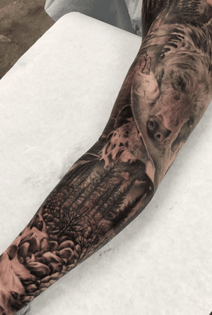 Finished off this nature sleeve with this river scene. Happy how this sleeve all came out. I gotta lot of projects can’t wait to finish this year! Who’s next!? #peaces #nature #trees #beartattoo #naturesleeve #guyswithtattoos #landscapetattoo #blackandgrey #realism #empireinks #blessed #motivation #cypress #oc #longbeach #ontothenext