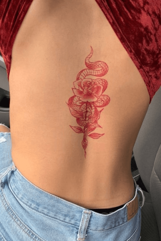 Red inked dragon tattoo down the spine  wwwotziappcom  Back tattoo  women Red ink tattoos Tattoos for women