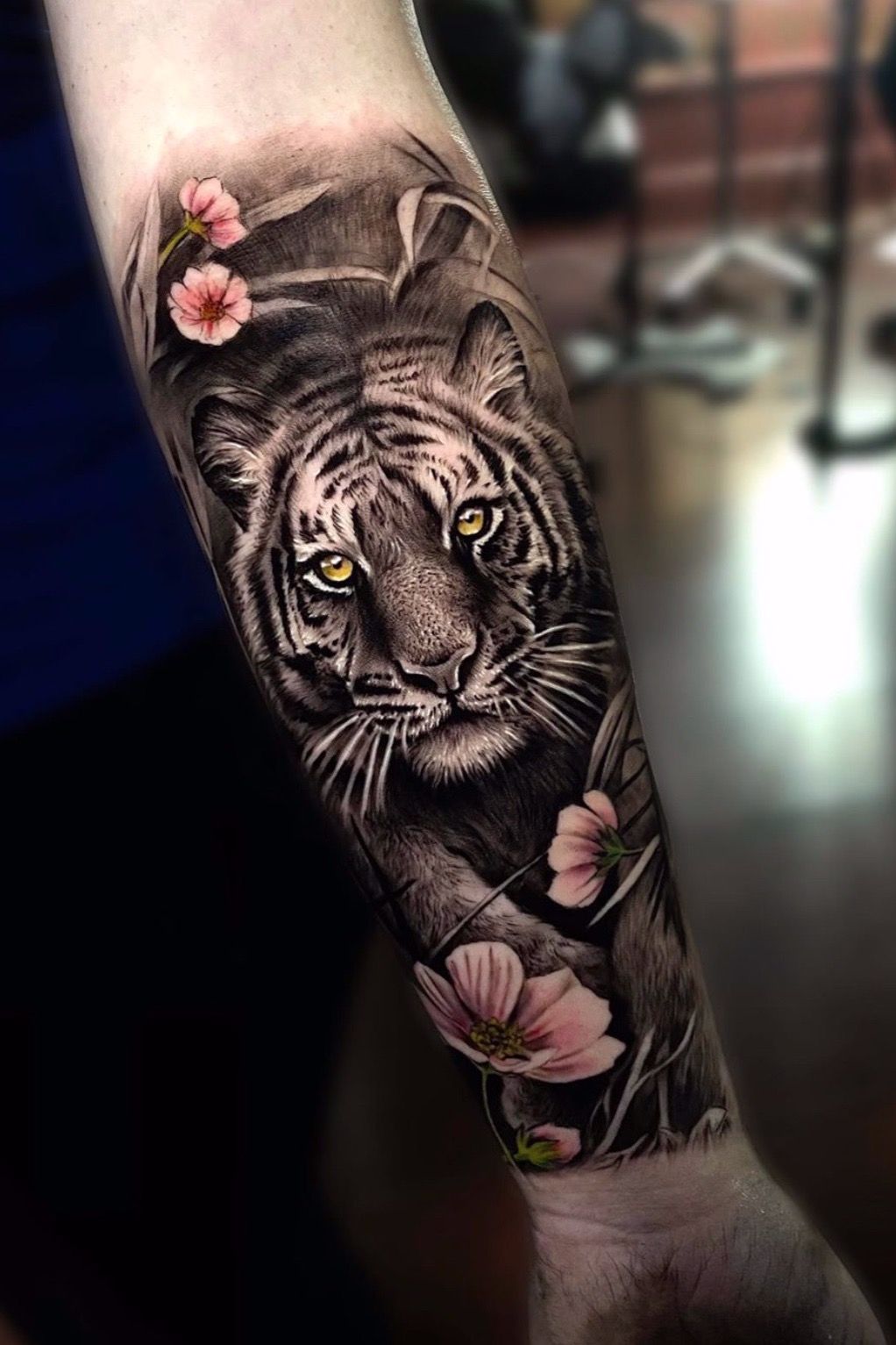 12 Best Tiger and Flower Tattoo Designs  Flower tattoo designs Forearm  tattoo women Tiger forearm tattoo