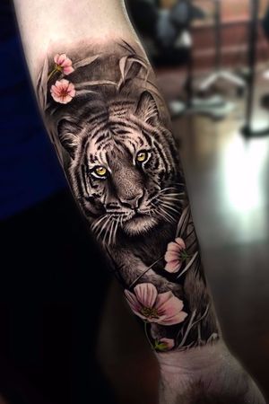 Tiger with flowers. Inner forearm.