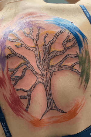 Tree of life with a little fun circle of life with colors. Freehand 