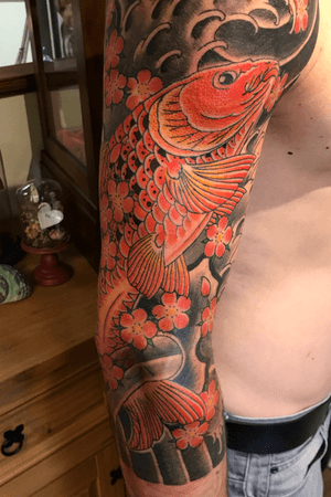 Koi sleeve done at Old Century Tattoo, Chur