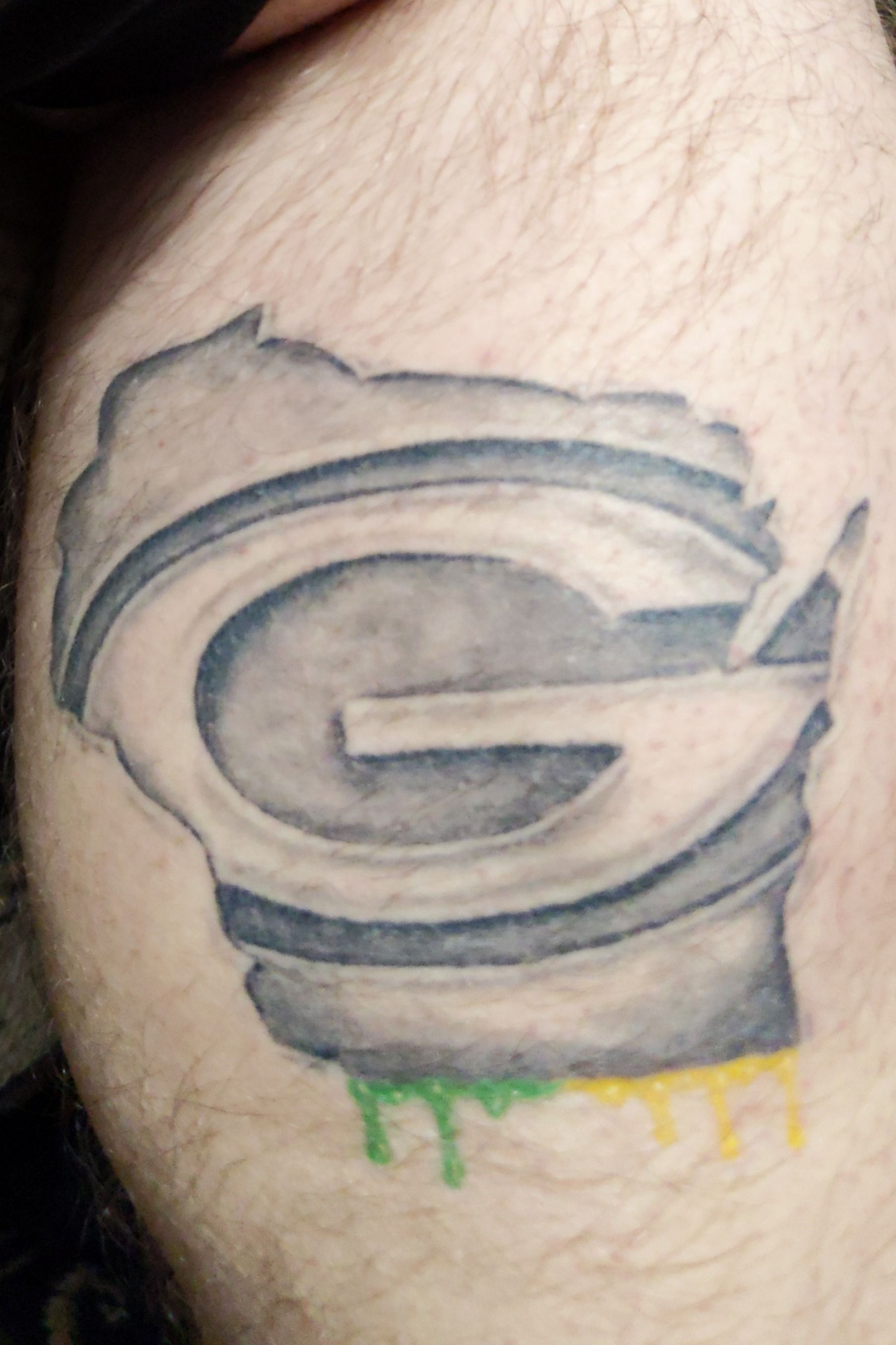 Man gets tattoo after meeting Packers QB Aaron Rodgers in Hawaii getting  his autograph