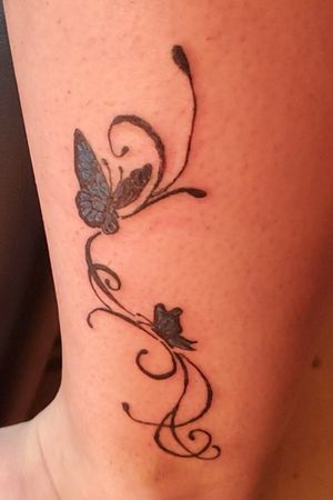 Butterfly ankle tattoo