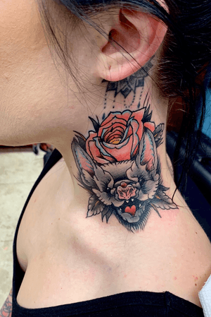 Colorful rose and bat neck tattoo