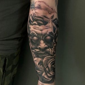 Ancient statue of Zeus sleeve arm tattoo in black and grey realism, London, UK | #blackandgreytattoos #realistictattoos #sleevetattoos #sculpturetattoos #zeustattoo