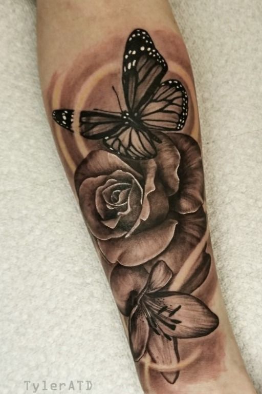 Black and grey Lily tattoo by Lenny  Lily tattoo Candy tattoo Tattoos