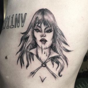 Single needle Vampirella tattoo