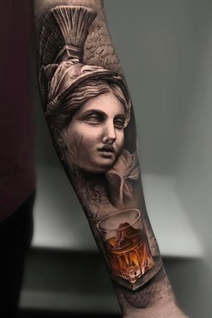 Atenea in inner forearm with a glass of Whiskey (with a little secret inside)