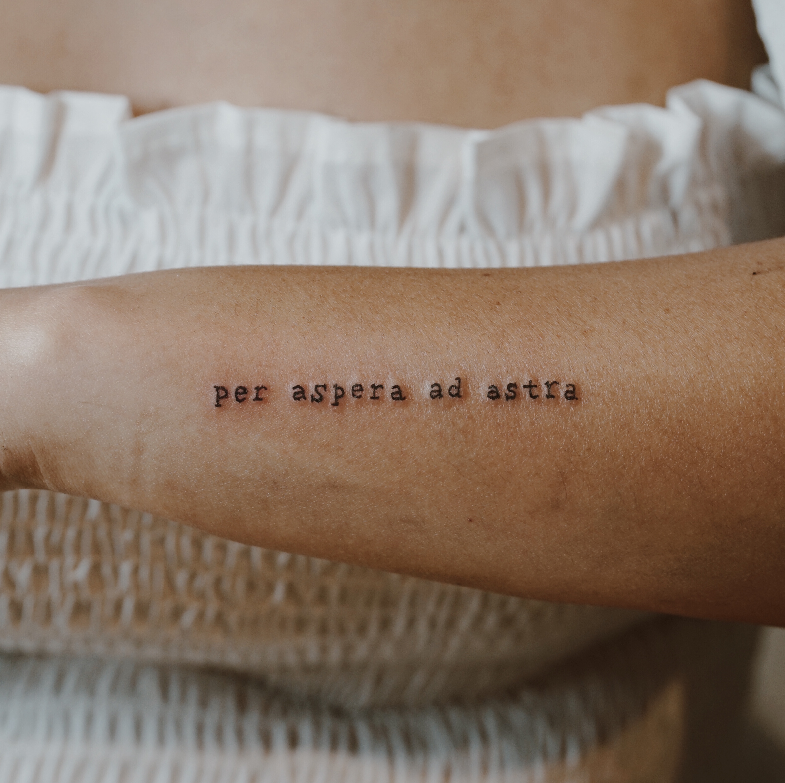 Per aspera ad astra tattoo on the chest  Writing tattoos Small chest  tattoos Tattoo fonts