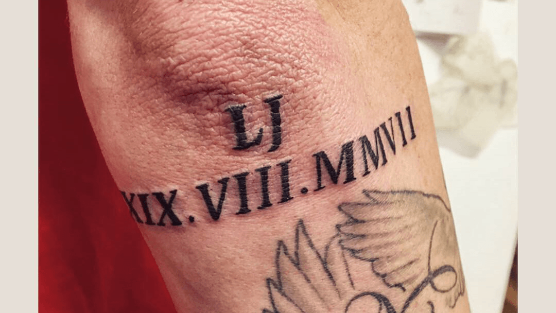 any ideas to cover up these roman numerals looking for cover up with  blackred pref trad style  rTattoocoverups