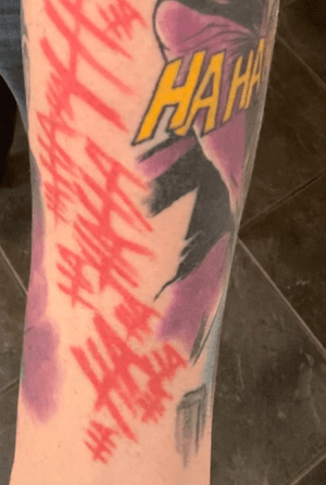 The hahaha is a wrap around from my wrist up and around my arm ending on my shoulder and back. Part of my Joker sleeve. I might extend this around my torso at some point
