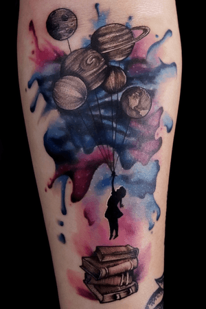 A watercolor galaxy tattoo by Justin Fleetwood