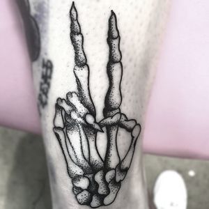 Skeleton hand tattoo