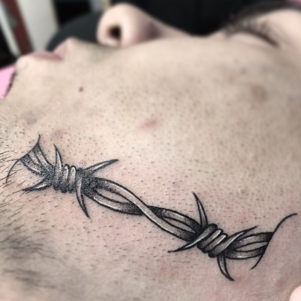 Barbed Wire Tattoos: Classic American Edge