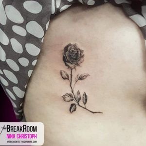 Rose on the ribs by Nina. 