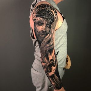 Jesus Christ passion  full sleeve tattoo in black and grey realism, London, UK | #blackandgreytattoos #realistictattoos #fullsleevetattoos #portraitattoos #londontattoosrtist
