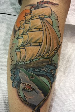 Neotraditional clipper ship and shark tattooed while at the Chicago Tattoo Convention