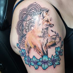 Fox tattoo with mandala and flowers
