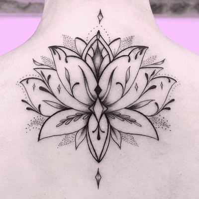 Tattoo by Rachel aka stickswell #rachel #stickswell #lotus #backtattoo #ornamental #floral #mandala