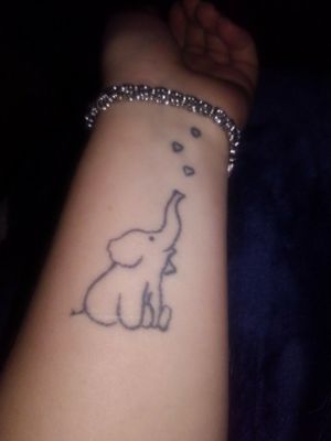 This was my first tattoo, I got it on my 18th birthday.It was a long day actually because I had to go to the DMV and get an ID card that wasn't my military at the time. So I waited several hours to get a small elephant on me.