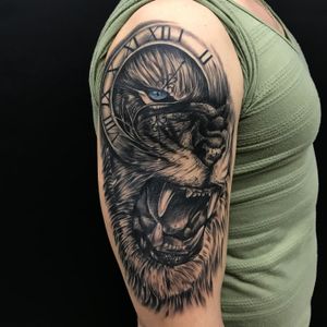 Lion Clock Arm Tattoo