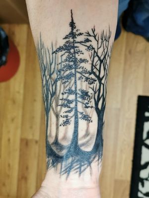 Dark trees / dark forest.My 10th tattoo, session two by Julie Manson. 21st January 2020