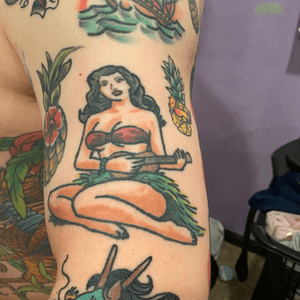 Uke Girl by Travis Smith: Lost Lakes Tattoo Madison. Smoking Pineapple by Andrea Bartsch - Saint Sabrinas Minneapolis. Flower Pineapple: unknown artist Madison Wi