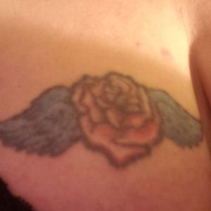 This represents my mother. She loved her roses and passed away when I was a little girl.  So you get the rose with angel wing.