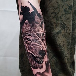 Wolf realism tattoo
