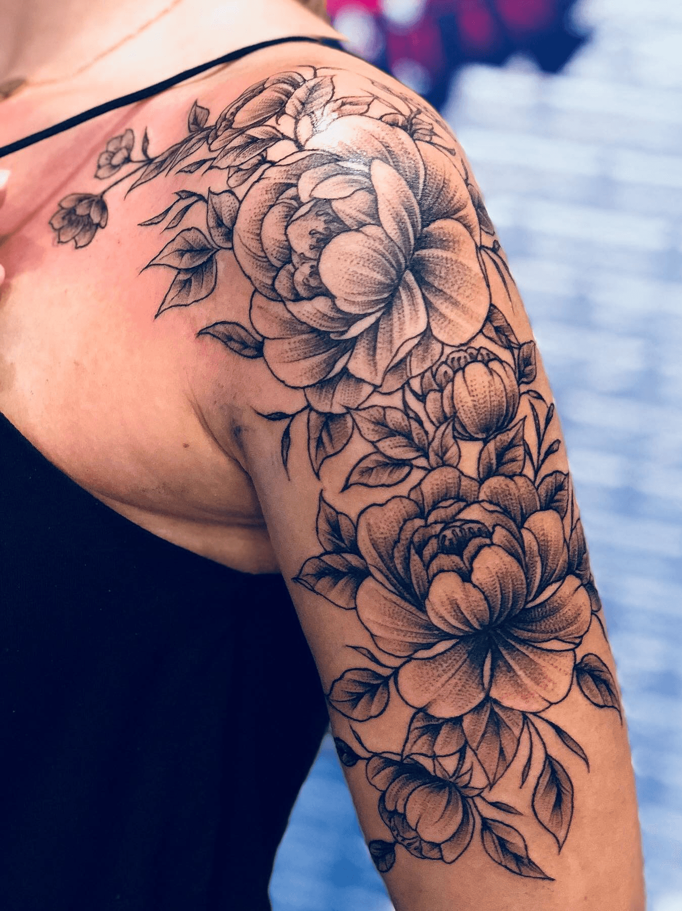 Delicate and feminine whip shaded flower tattoo on the thigh by Tiny T If  you would like something by this ar  Tattoos Flower tattoo Shoulder  tattoos for women