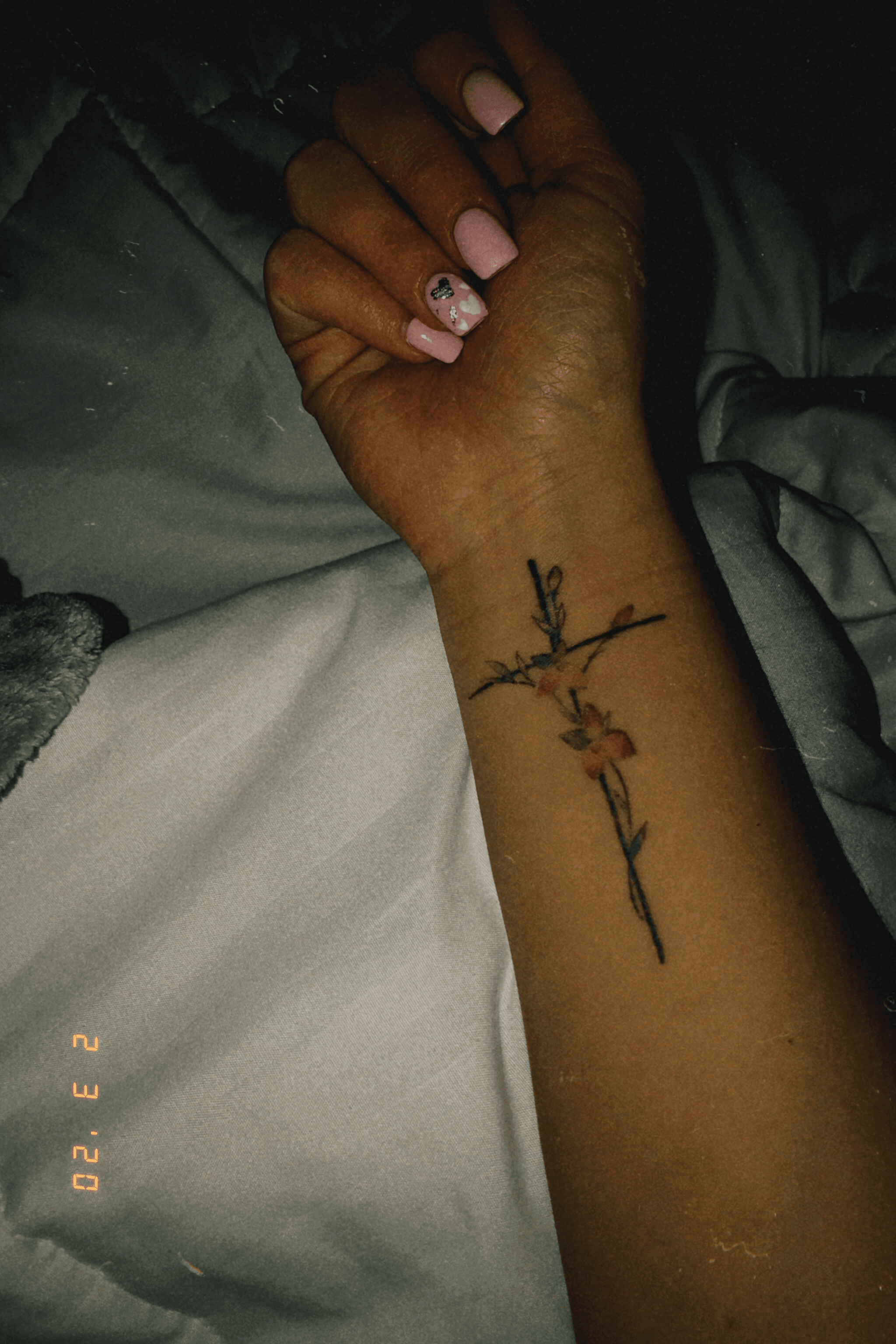 side wrist cross tattoo