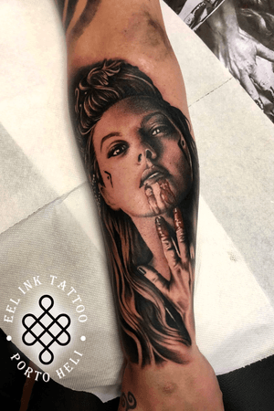Lagertha arm tattoo.